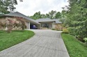 Resting perfectly on Fairway #1, this Fox Den home offers views for sale in Knoxville Tennessee Knox County County on GolfHomes.com