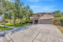 Welcome to this stunning 5-bedroom pool home with golf course for sale in Land O Lakes Florida Pasco County County on GolfHomes.com