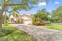 Very rarely available corner villa overlooking a canal and the for sale in Pompano Beach Florida Broward County County on GolfHomes.com