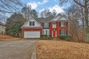 Welcome to this spacious home with a fully finished basement for sale in Lawrenceville Georgia Gwinnett County County on GolfHomes.com