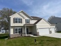 This is a spacious, luxurious 2-story home in a desirable area for sale in Crown Point Indiana Lake County County on GolfHomes.com
