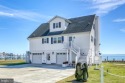 ABSOLUTE STUNNER!! Waterfront living on the Chincoteague Bay for sale in Greenbackville Virginia Accomack County County on GolfHomes.com