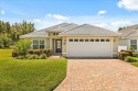 Welcome to this thoughtfully designed home on Deer Island, where for sale in Tavares Florida Lake County County on GolfHomes.com