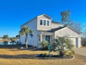 This home is all you need to live a fabulous beach life on the for sale in Surfside Beach South Carolina Horry County County on GolfHomes.com