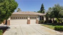 Spacious Family Home boasting a large pool, 4 bedrooms, and for sale in Chowchilla California Madera County County on GolfHomes.com