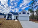 MOVE IN READY!! 4BR/3Bath home with GORGEOUS golf course & pond for sale in Loris South Carolina Horry County County on GolfHomes.com