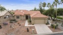 Nestled in a vibrant gated active adult community, this stunning for sale in Sun Lakes Arizona Maricopa County County on GolfHomes.com