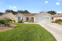 Welcome home to this enhanced Cypress (Vera Cruz) model for sale in The Villages Florida Sumter County County on GolfHomes.com