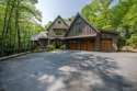 Escape to this stunning mountain home, located behind the gates for sale in Cashiers North Carolina Jackson County County on GolfHomes.com
