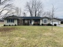 This charming three-bedroom, two-bath brick home offers a for sale in Monticello Kentucky Wayne County County on GolfHomes.com