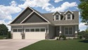 This 2024 Parade of Homes by Hodge Construction overlooks the for sale in Solon Iowa Johnson County County on GolfHomes.com
