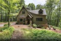 Welcome to this charming custom cottage, nestled among lush for sale in Glenville North Carolina Jackson County County on GolfHomes.com
