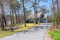 Welcome to this lovely three-bedroom, two-bath Cape-style home for sale in Brewster Massachusetts Barnstable County County on GolfHomes.com