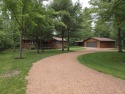 Gorgeous Log Cabin in highly desired location.  Deeded Access to for sale in Arkdale Wisconsin Adams County County on GolfHomes.com