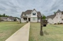 Luxury home in Auburn University Club with 3 stories of living for sale in Auburn Alabama Lee County County on GolfHomes.com