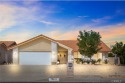 Located in the popular Seven Hills 55+ community, this charming for sale in Hemet California Riverside County County on GolfHomes.com