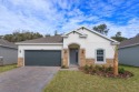 Introducing the Mulberry B 1,938-square-foot single-story in for sale in Tavares Florida Lake County County on GolfHomes.com