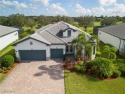 Nestled along the 15th fairway in the sought-after gated for sale in Alva Florida Lee County County on GolfHomes.com