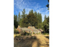 Built in 1934 Custom story book cabin. Sitting on 7.65 private for sale in Arnold California Calaveras County County on GolfHomes.com