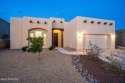 Magnificent Pueblo designed home with 3 bedrooms 2 and half for sale in Las Cruces New Mexico Dona Ana County County on GolfHomes.com