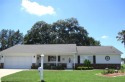 DESIGNER SYLISH MOVE IN READY HOME WITH A TROPICAL PARADISE for sale in Dunnellon Florida Marion County County on GolfHomes.com