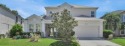 This beautiful home is located in The Oaks community in a for sale in Kissimmee Florida Osceola County County on GolfHomes.com