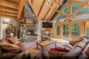 Discover the timeless appeal of mountain living in this classic for sale in Sapphire North Carolina Transylvania County County on GolfHomes.com