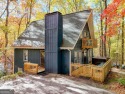 A turnkey tranquil cottage in the woods awaits, nestled at the for sale in Dillard Georgia Rabun County County on GolfHomes.com