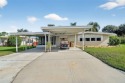 THIS CHARMING 2-bedroom, 2-bath mobile home is nestled in the for sale in Tavares Florida Lake County County on GolfHomes.com