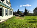 Nestled on 5.2 acres of picturesque land with beautiful views of for sale in Jefferson New Hampshire Coos County County on GolfHomes.com