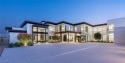 Completed in 2024, this all-new custom estate in The Summit sits for sale in Las Vegas Nevada Clark County County on GolfHomes.com