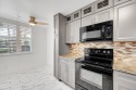 Beautifully updated 3 bedroom, 2 bath first-floor corner condo for sale in Sunrise Florida Broward County County on GolfHomes.com