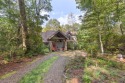 Welcome to 86 Meadow Ridge, a stunning retreat in High Hampton's for sale in Cashiers North Carolina Jackson County County on GolfHomes.com