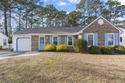 Enjoy relaxed coastal living in this well-maintained two-bedroom for sale in Murrells Inlet South Carolina Horry County County on GolfHomes.com