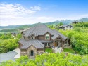 Nestled in the trees on just over an acre of land, this 4 for sale in Park City Utah Summit County County on GolfHomes.com