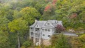 Commandingly sited within the prestigious Wade Hampton Golf Club for sale in Cashiers North Carolina Jackson County County on GolfHomes.com