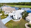 Located in an exclusive gated community with a championship for sale in Titusville Florida Brevard County County on GolfHomes.com