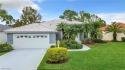 Beautifully-maintained Heron home nestled in HERONS GLEN COUNTRY for sale in North Fort Myers Florida Lee County County on GolfHomes.com