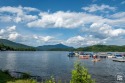 A spectacular lake level unit at the Whiteface Club and Resort for sale in Lake Placid New York Essex County County on GolfHomes.com