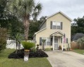 Charming home with a hot tub in fenced, private backyard in a for sale in Myrtle Beach South Carolina Horry County County on GolfHomes.com