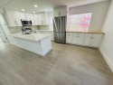Enjoy life on the water with lake and golf course views from for sale in Delray Beach Florida Palm Beach County County on GolfHomes.com