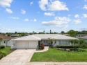 Tucked away in the prestigious waterfront enclave of Dana Shores for sale in Tampa Florida Hillsborough County County on GolfHomes.com