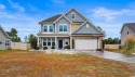 Welcome home to this 4-bedroom, 2.5-bathroom home with a 2-car for sale in Myrtle Beach South Carolina Horry County County on GolfHomes.com