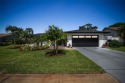 Captivating golf course retreat with modern upgrades. Step into for sale in Seminole Florida Pinellas County County on GolfHomes.com