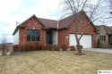 On the 18th fairway of Woodland Hills Golf Course & a short walk for sale in Eagle Nebraska Otoe County County on GolfHomes.com