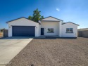 NEWLY CONSTRUCTED HOME OFFERING AN 8 Year Limited Structural for sale in Arizona City Arizona Pinal County County on GolfHomes.com