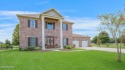 Showstopping two-story home on the pond in Squirrel Run! This for sale in New Iberia Louisiana Iberia Parish County on GolfHomes.com