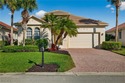 Enjoy peaceful lakefront living in this popular Heron model for sale in Fort Myers Florida Lee County County on GolfHomes.com