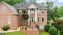 Welcome to an oasis of luxury situated on Mirror Lake's for sale in Villa Rica Georgia Douglas County County on GolfHomes.com