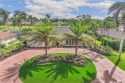 Beautifully maintained 4 bedroom 2.5 bathroom pool home on an for sale in Naples Florida Collier County County on GolfHomes.com